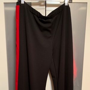 Black wide leg pants with red stripe